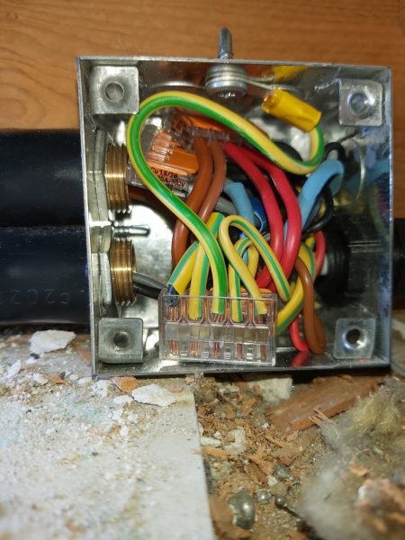 Close up image of wiring inside a junction box, Supplied by steel armoured cable, Rewire, Faversha Ketn 