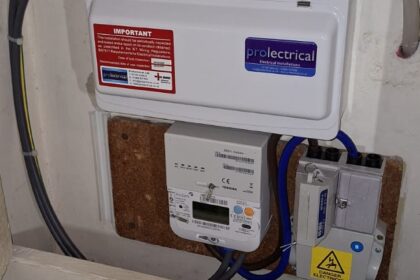 With the lid on, fully enclosing and protecting the fuseboard in metal. 